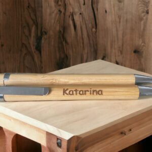 Bamboo pen on a wooden table