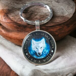 keyring with a picture of a white wolf on it