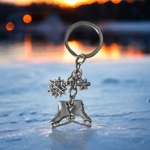 2 ice skates and snowflake charms on a keyring