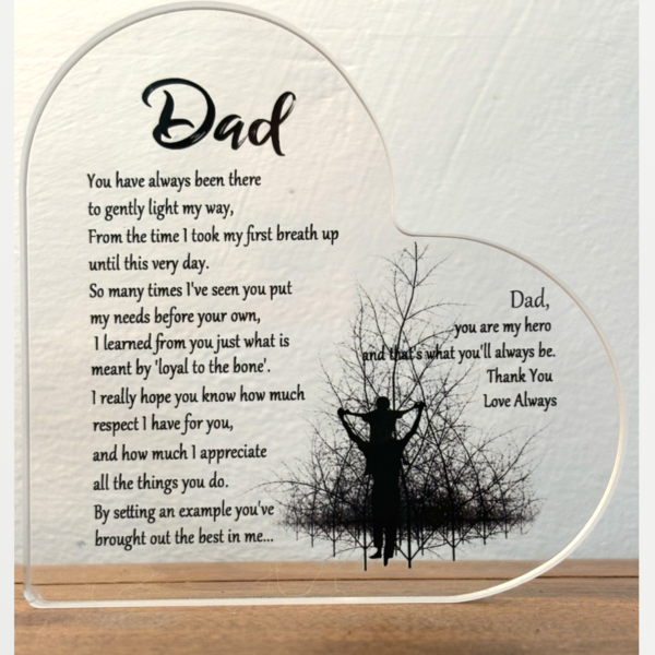 A plaque with a poem for dad stood up on a wooden table against a white background.