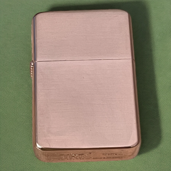 Bronze coloured zippo style lighter